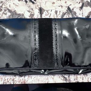 Cole Haan black patent leather clutch